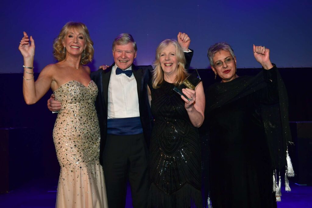 National win. Margot Whittaker won the Outstanding Achievement in social care award at the Caring UK Awards, pictured with event host Emma Jesson, an ITV weather presenter.